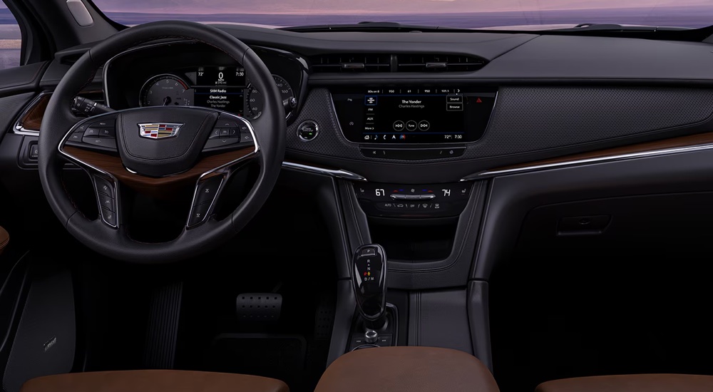 The steering wheel and dashboard in a 2024 Cadillac XT6.