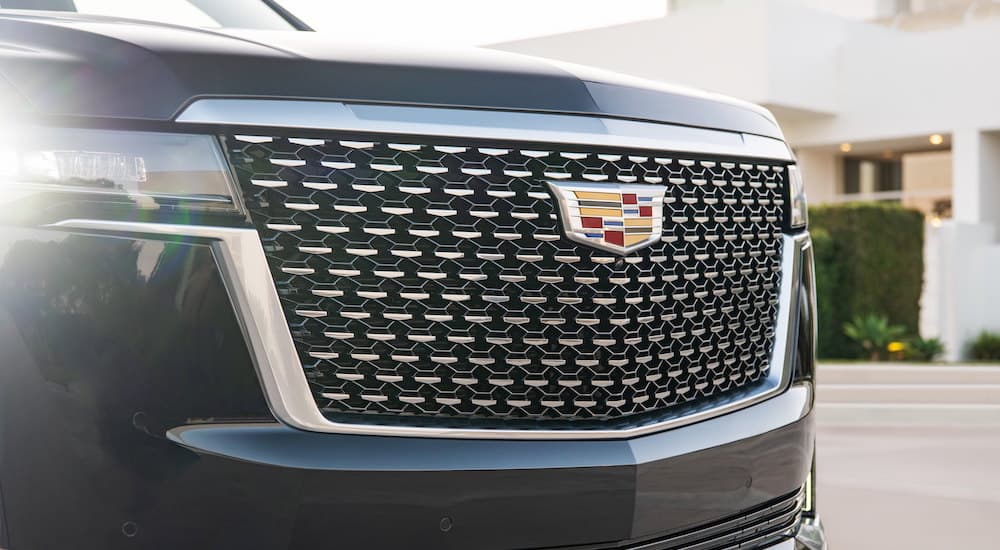 Close-up of the grille on a 2021 Cadillac Escalade, a used Cadillac for sale.