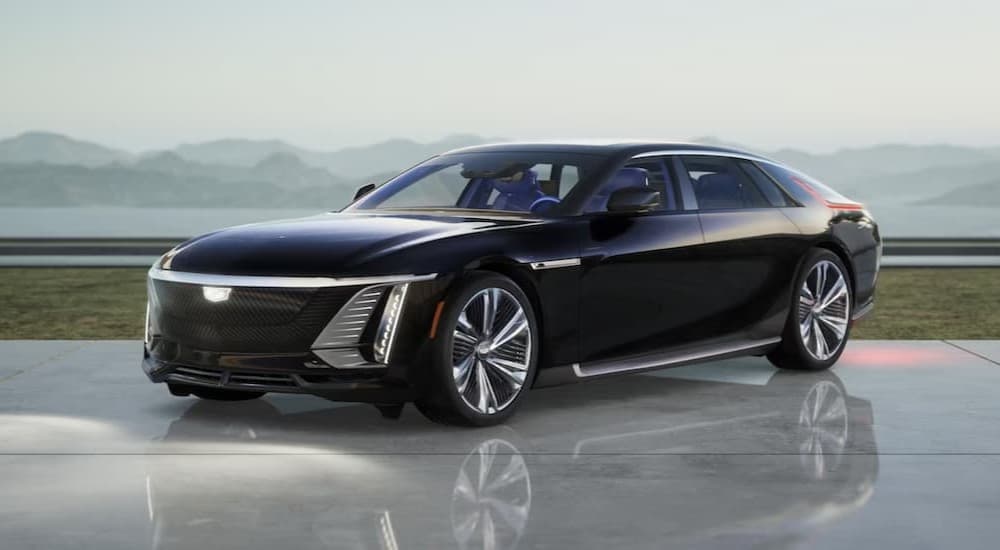 A black 2024 Cadillac CELESTIQ parked on a showroom floor.