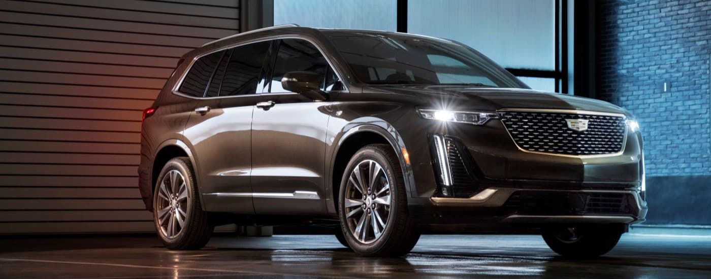 Brown 2020 Cadillac XT6 parked on a driveway.