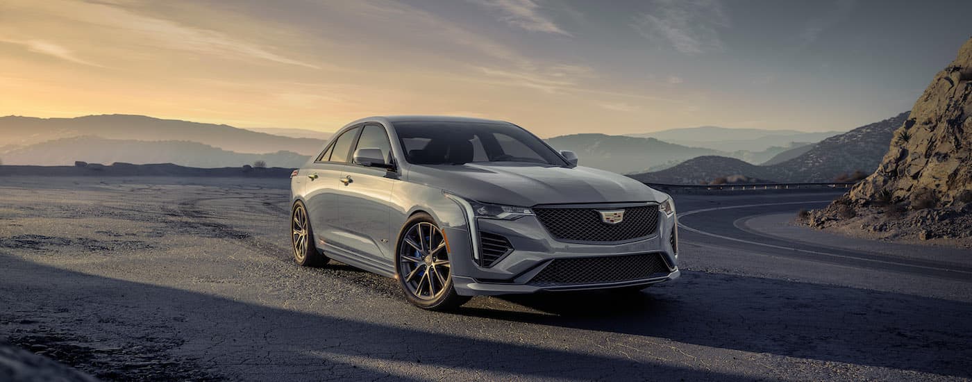 A grey 2024 Cadillac CT4-V is shown from the front at an angle.