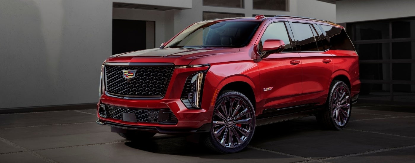 A red 2026 Cadillac Escalade from the front at an angle.