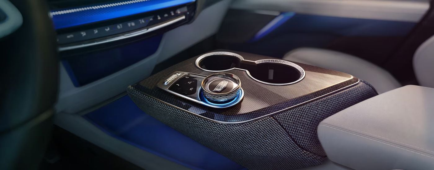 Close up of the center console and cupholders in the 2026 Cadillac OPTIQ.