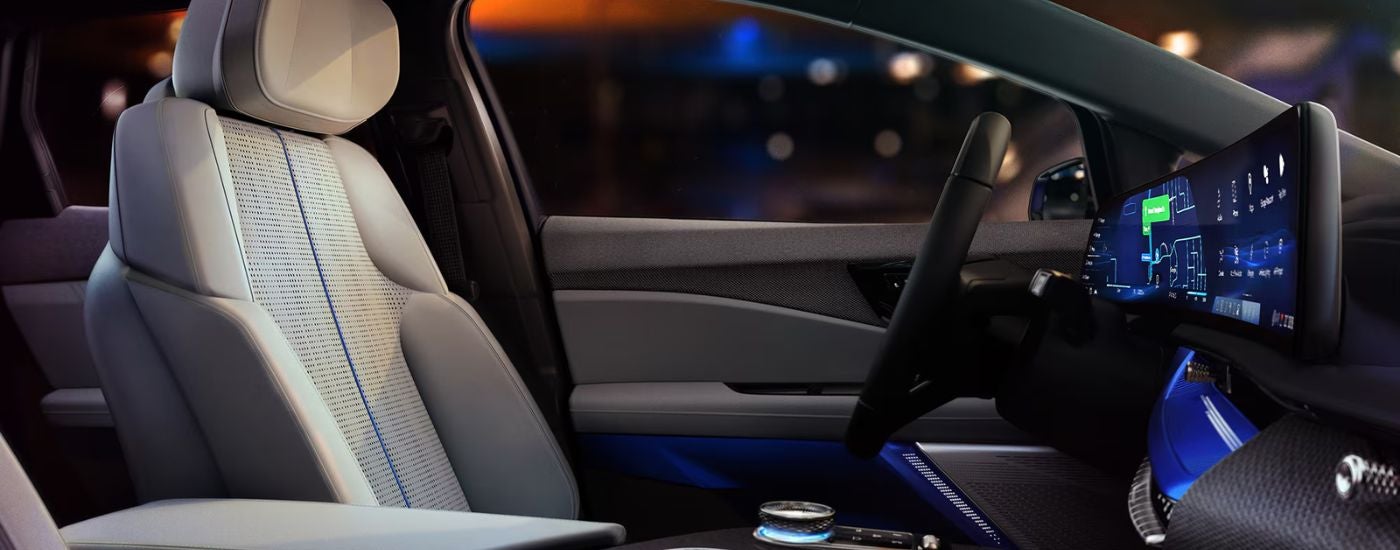 2026 Cadillac OPTIQ view of the drivers seat and steering wheel.
