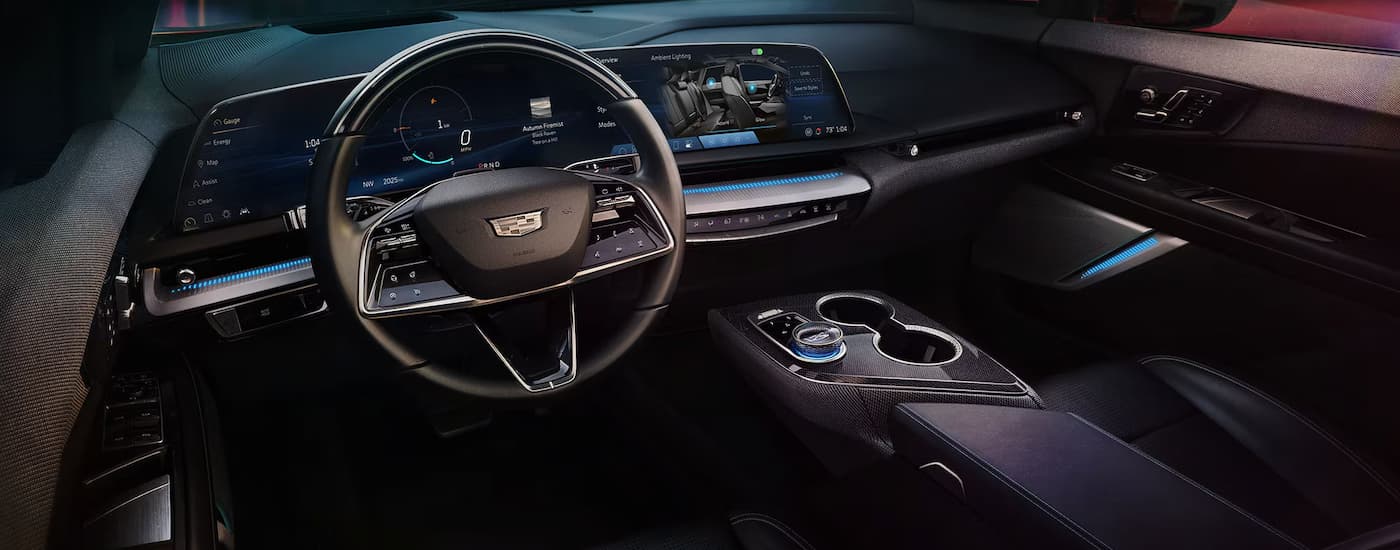 Black leather interior and dashboard in a 2025 Cadillac OPTIQ for sale