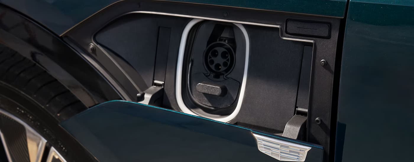 Charging port on a blue 2026 Cadillac LYRIQ.