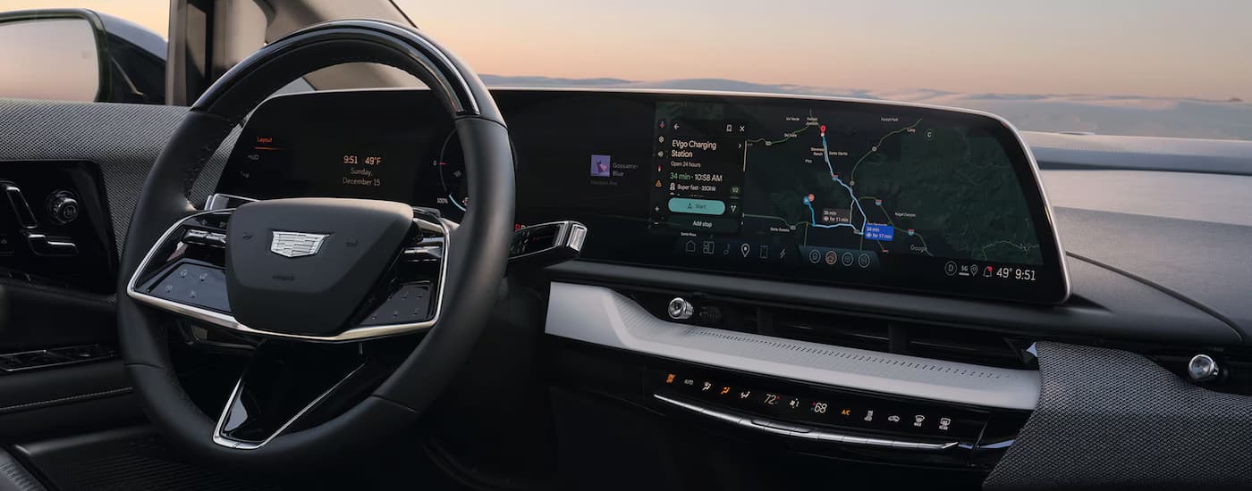 Infotainment display and digital gauge cluster in a 2026 Cadillac OPTIQ for sale near Farmington